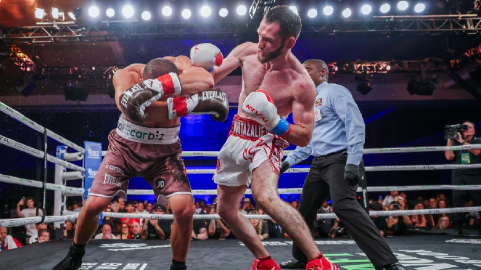 Murtazaliev punishes Tszyu to retain IBF super welterweight crown