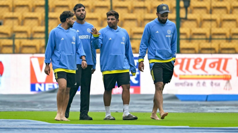 Rain delays New Zealand chase of 107 to beat India in first Test