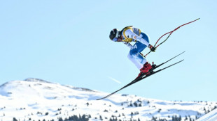 Johnson wins shock world downhill gold, US teammate Vonn 15th