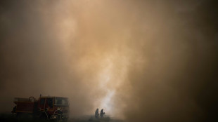 French fires coming under control as heat drops 