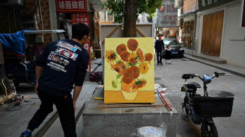 China's 'art factory' painters turn from fakes to originals