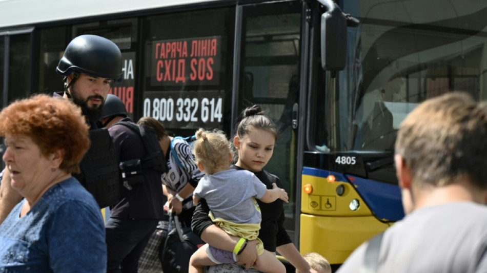 Tearful families evacuate as Russian forces advance towards Pokrovsk