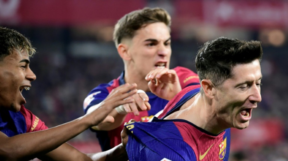 Barca rout Sevilla to mantain title charge