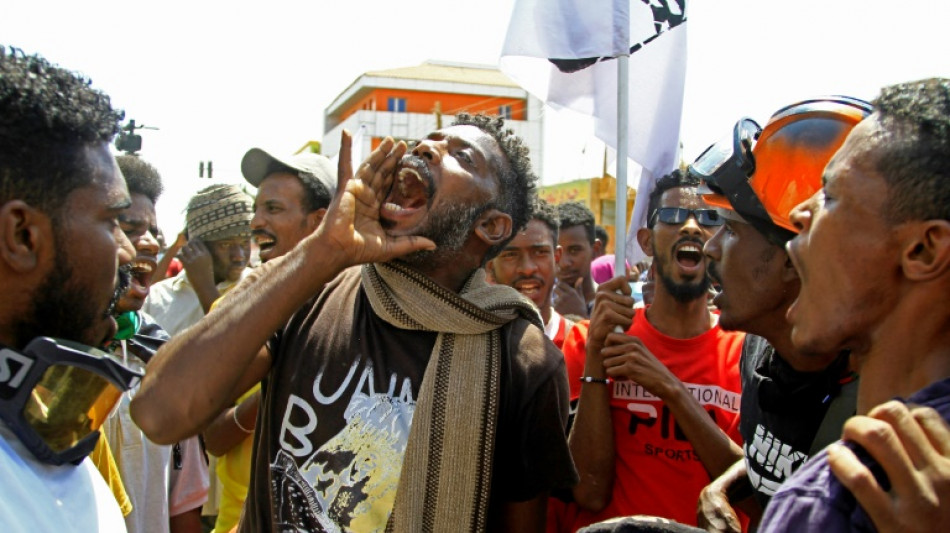 Sudanese protester killed as thousands march against coup