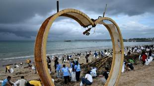 Volunteers clean up Bali's beach from "worst" monsoon-driven trash