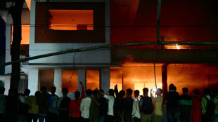 Bangladesh protesters raze buildings linked to ousted leader