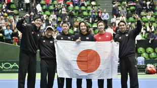 Japan beat Britain in Davis Cup as Serbia lose to Denmark