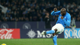 Napoli beat Juventus to continue Serie A title charge