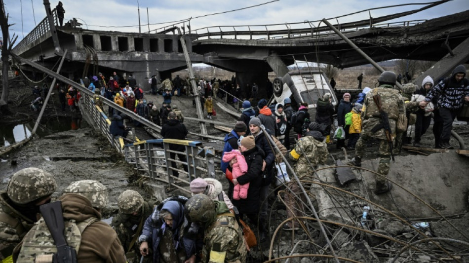 Ukrainians run for their lives from Russian bombs