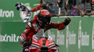 Bagnaia wins wet Thai MotoGP to close gap on title rival Martin