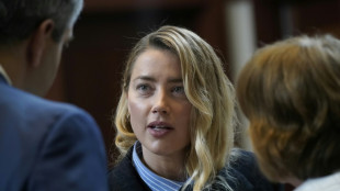 Amber Heard takes stand in blockbuster defamation trial