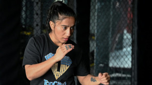 Pioneering Pakistan woman MMA fighter breaks barriers... and arms